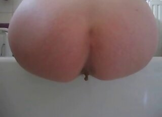 Wiping the ass of the big booty slut after the pooping