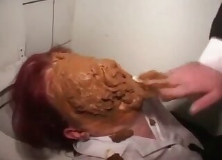 Hairy asshole is shitting directly on the redheaded MILF