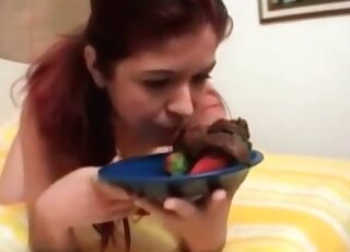Redhead slowly stripping and licking some feces