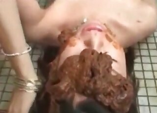 Asian does not mind having shit on her face