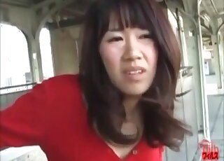 Girl in a cute skirt pooping while outdoors